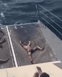 Wet Man Lying Sea Water Splash GIF