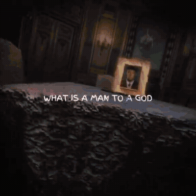 What Is A Man To A God Written On Wall Dark Room GIF