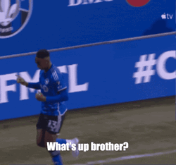 Whats Up Brother Soccer Player Hand Signal GIF