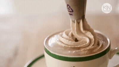 Whipped Cream Poured Into Coffee With Kin Logo GIF