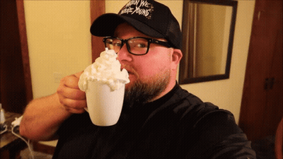 Whipped Cream Poured Into Coffee With Kin Logo GIF