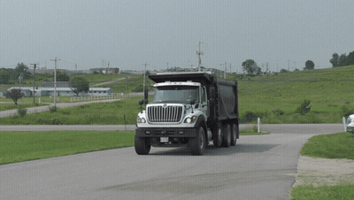 White And Black Dump Truck With NC License Plate GIF