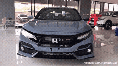 White And Black Motorcycle With Collector GIF