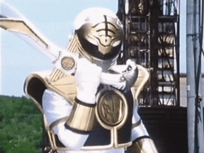 White And Gold Power Ranger Holding Sword GIF
