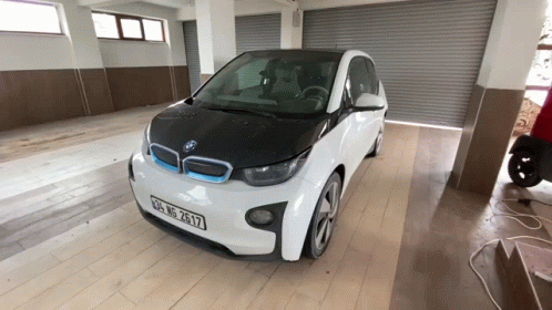 White BMW With License Plate RH GP 2617 GIF