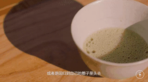 White Bowl Filled With Green Liquid GIF