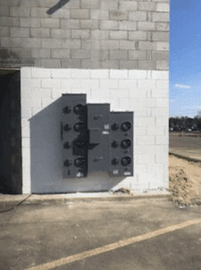 White Brick Wall With Boxes GIF