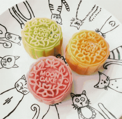 White Bunny Marshmallows On Wooden Table GIF
