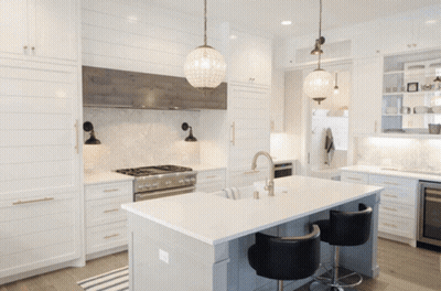 White Cabinets Black Chairs Large Island Kitchen GIF