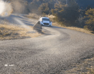 White Car Driving Down Road With WTCC Logo GIF