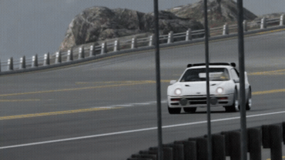 White Car Driving On Highway With Mountain GIF