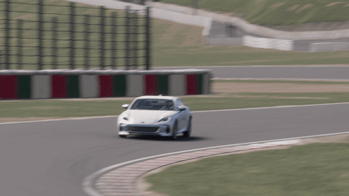 White Car Driving On Race Track GIF