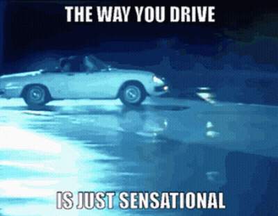 White Car Driving On Wet Road Saying The Way You Drive Is Just Sensational GIF