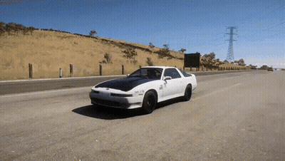 White Car Driving With License Plate Saying SNR GIF