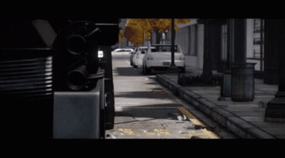 White Car Parked By Roadside Trash Can GIF