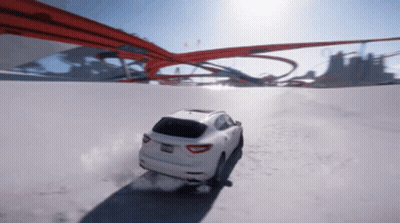 White Car With California License Plate Driving Down Snowy Road GIF