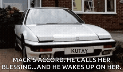 White Car With Kutay Plate At Brick House GIF