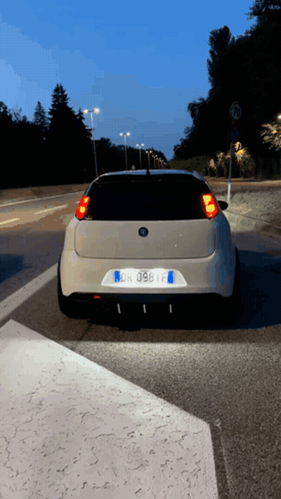 White Car With License Plate DK 098 F GIF