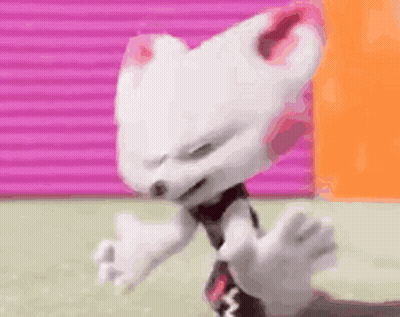 White Cartoon Character Making Funny Face Against Pink Wall GIF