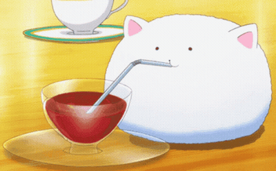 White Cat Drinking From Straw Next To Red Liquid GIF