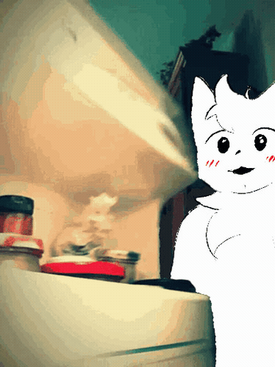White Cat Standing Next To Refrigerator GIF