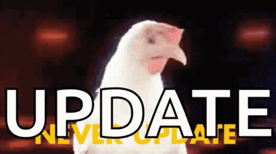 White Chicken In Front Of Update Sign GIF