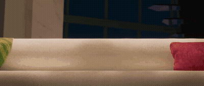 White Couch With Two Pillows In Dark Room GIF