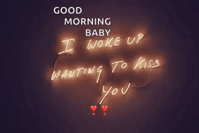 White Dog With Black Spot Laying Down GIF