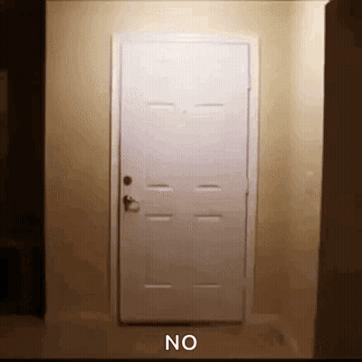 White Door In Dark Room Saying No GIF