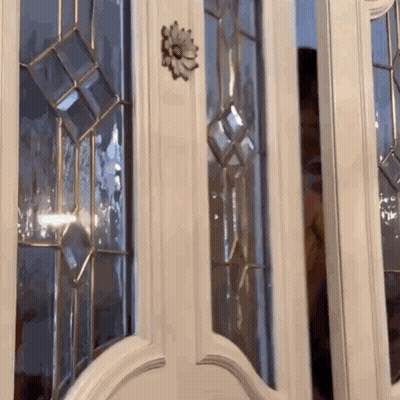 White Door With Stained Glass And Flower GIF