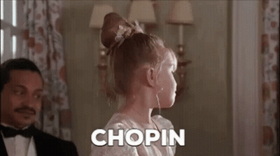 White Dress Girl Playing Piano, Tuxedo Man Watching GIF