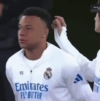 White Emirates Fly Butter Player Patted On Back GIF