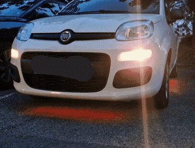 White Fiat Car Parked In Dark GIF