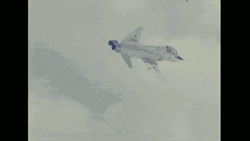 White Fighter Jet Falls Down GIF