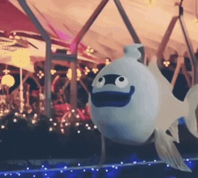 White Fish With Blue Mouth GIF