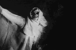 White Flying Skeleton Scary Face GIF