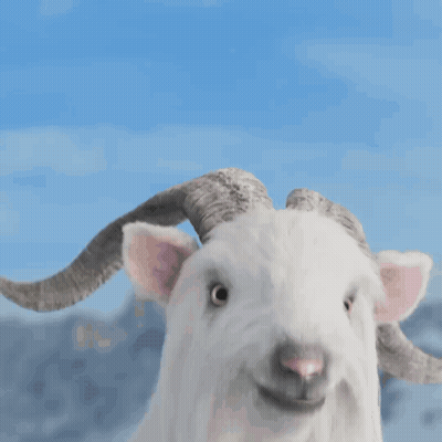 White Goat With Horns Looks At Camera GIF