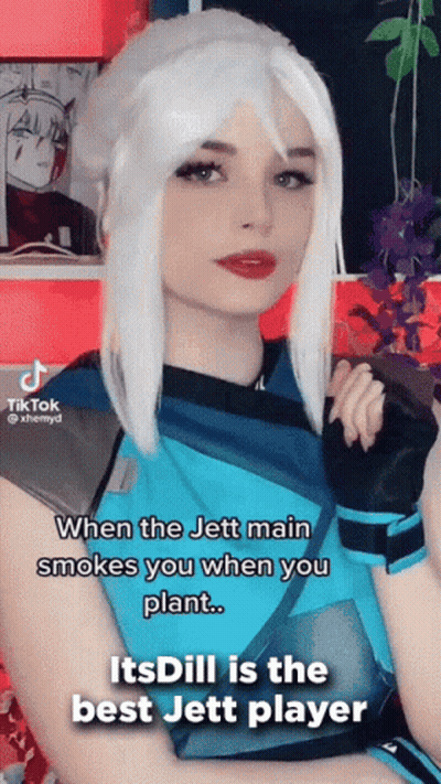 White-Haired Woman In Blue Shirt And Gloves GIF