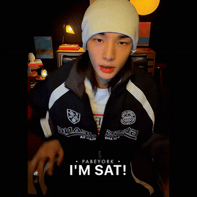White Hat Black Jacket Person Saying I'm Sat GIF