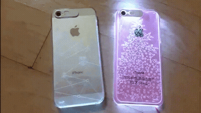 White IPhone Next To Pink IPhone GIF