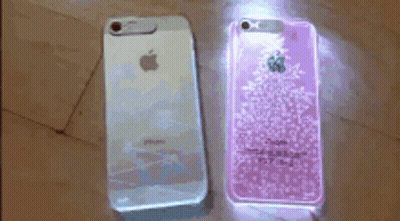White IPhone Next To Purple IPhone GIF