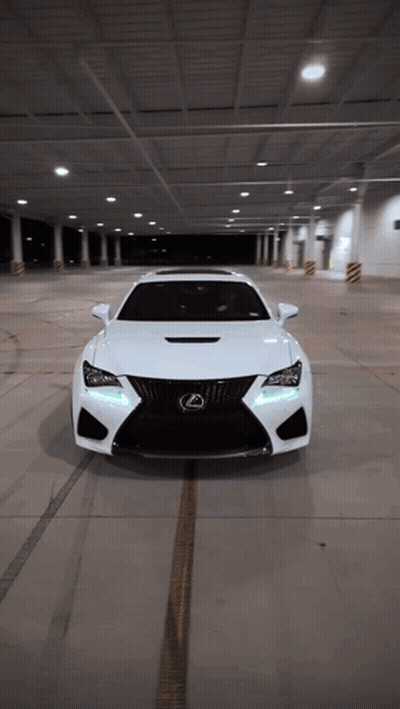 White Lexus Sports Car Parked In Parking Garage GIF