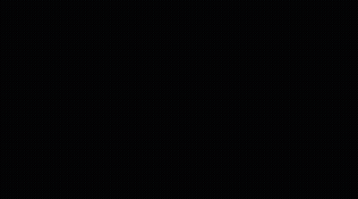White Light Shining On Green Surface In Dark Room GIF