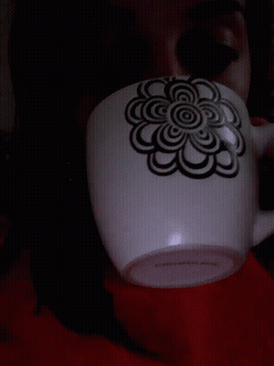 White Mug With Black And White Flower GIF