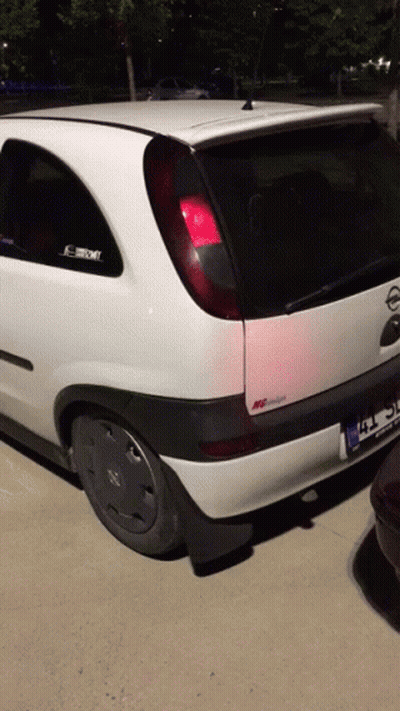 White Opel Car With TC License Plate GIF