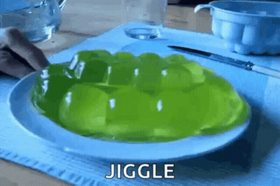 White Plate With Green Jelly Saying Jiggles GIF