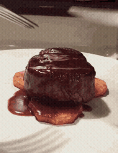 White Plate With Steak And Sauce GIF