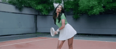 White Poodle Standing On Hind Legs Looking At Camera GIF