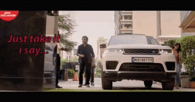 White Range Rover Parked At Building Saying Just Take It I Say GIF