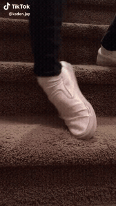 White Shoes Walking Down Stairs TikTok Watermark GIF